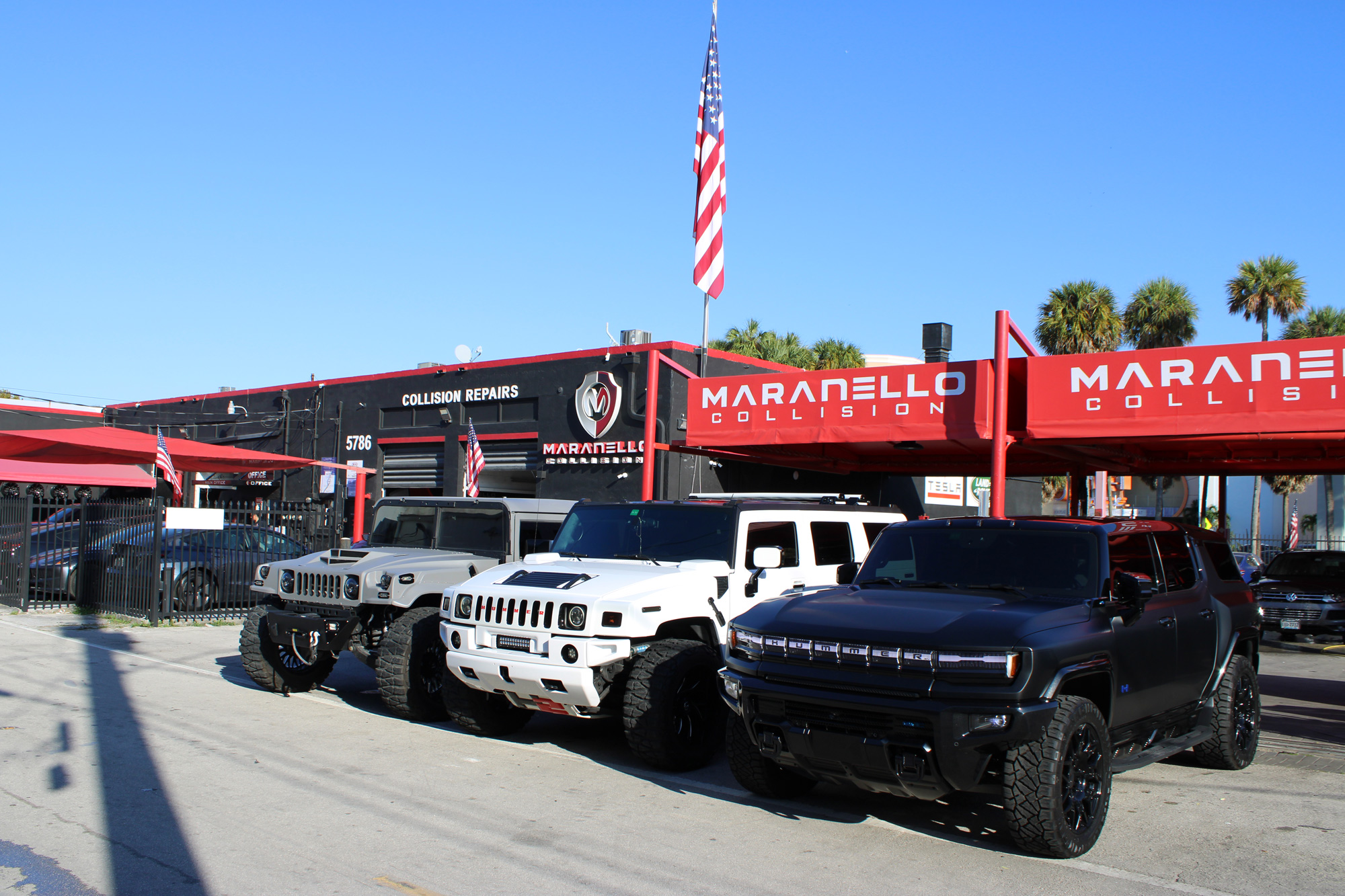 Exterior view of Maranello Collision auto body shop in Miami.